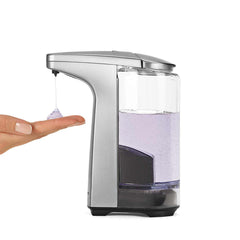 8 fl.oz. sensor pump - brushed nickel - lifestyle with hand image